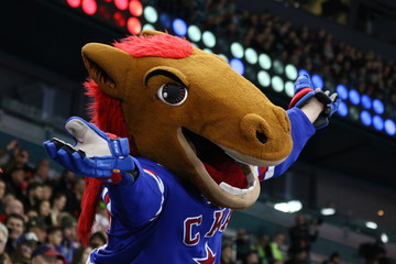 the mascot of the ska hockey club welcomes the spectators of the winning hockey match
