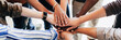 © rawpixel.com - Group of diverse people stacking hands in the middle