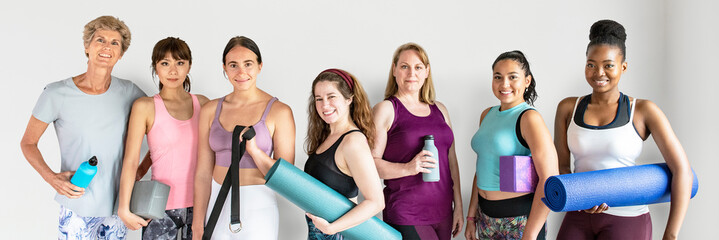 Wall Mural - Group of diverse people in yoga class