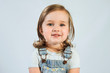 © kaloriya - Portrait of 2 year old happy smiling baby on white background.