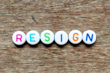 Sticker - White bead with color letter in word on resign wood background