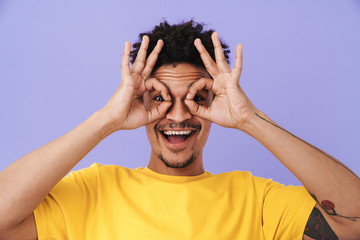 Poster - Photo of cheerful african american man showing ok sign and smiling