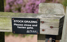 Gate Sign Asking People To Close And Fasten The Gate Because Of Stock Grazing, Peak District National Park, England, UK