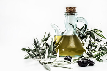 bottle of olive oil and olives