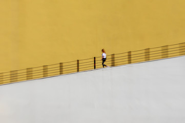 A young woman walking on the road