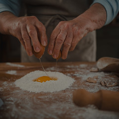 grandmother prepares fresh homemade pasta