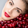 © Svetlana Fedoseeva - Beautiful woman with red berries. Woman with a sweet cherry. Juicy cherries.