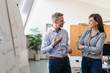 © Westend61 - Businessman and businesswoman having a meeting in office