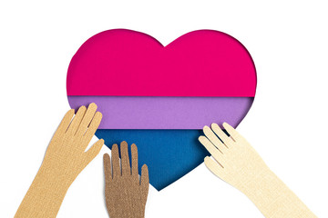 Bisexual flag in the form of paper cut out shape with blue, pink and violet colors. Love, pride, diversity, tolerance, equality concept