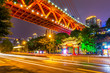 © robertharding - View of Masangxi Bridge and buildings near Arhat Buddhist Temple at dusk, Yuzhong District, Chongqing, China, Asia