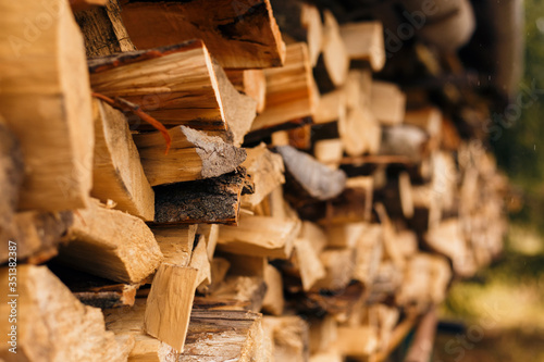 Fotografía Closeup of chopped firewood in a stack ready for burning.