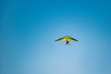 Hang Glider In The Blue Sky. Extreme Sport, Air Flights.