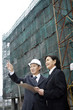 © ImageHit - Business people having discussion at the construction site