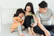 © 浩然 张 - Asian family playing in the living room