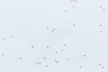 Wall Mural - White paper decorated with small hearts textured background