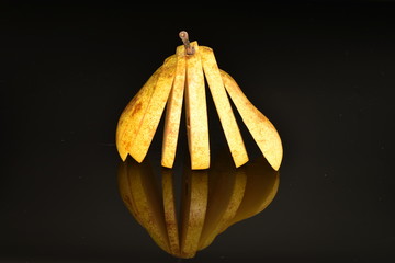 Juicy sweet, organic pears, close-up, on a black background.