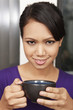 © ImageHit - Woman with a cup of coffee