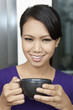 © ImageHit - Woman with a cup of coffee
