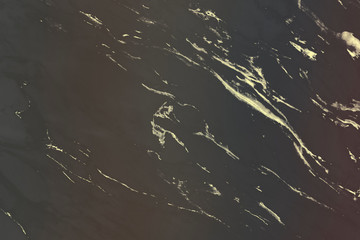Wall Mural - gold pattern on a black marble background illustration