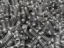 Close Up Fo Coiled Metal Springs For Background.Steel Coil Springs.