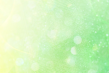 Wall Mural - bokeh pattern on a yellowish green background