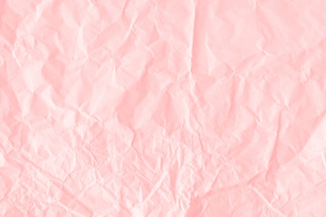Wall Mural - crumpled salmon pink paper textured background