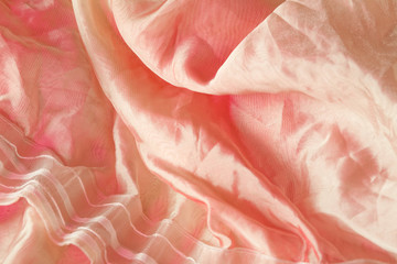 the texture of the silk fabric in pink