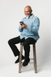 © rawpixel.com - Happy retired man using a smartphone