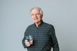 © rawpixel.com - Senior man with a glass of water