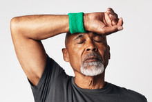 Athletic Senior Mean Wiping Off Sweat From His Forehead