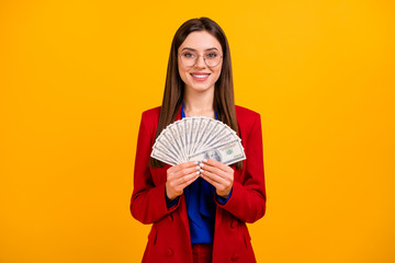 Sticker - Photo of classy attractive business lady hold hand fan bucks money rich successful worker wear specs red luxury office blazer blue blouse suit isolated yellow color background