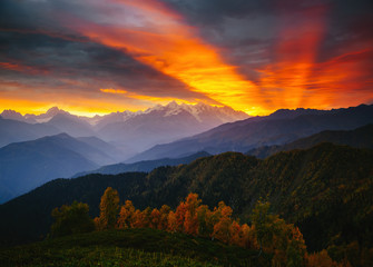 Photo Sur Toile - Fantastic brilliant sunrise with rays breaking through the clouds. Location place of  Upper Svaneti, Georgia country.