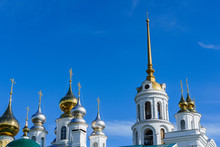 Golden Metal Domes Of An Orthodox Church And The Spire Of A Bell Tower