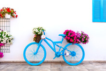 Charming Bar Decoration Design In Retro Style With Old Bicycle And Flowers