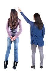 Poster - Back view of two pointing girl in sweater.