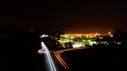 Light of street lamps and houses