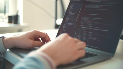 freelance man design web software. Closeup coding on screen, hands type html code and programming on screen laptop. Hacker work online. Coder testing virus security system. Develop internet project.