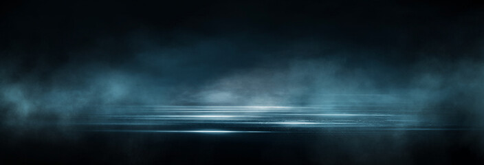 Wet asphalt, reflection of neon lights, a searchlight, smoke. Abstract light in a dark empty street with smoke, smog. Dark background scene of empty street, night view, night city.