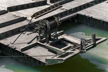 Manual winch on floating boat bridge mounted by the regiment of pontoniers and Engineers of the Spanish army.