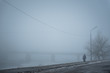 Foggy street in a winter morning