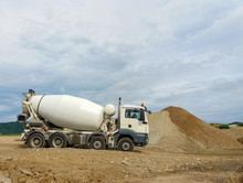 Concrete Mixer Truck Working On Construction Site.