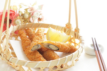 Wall Mural - Japanese food, Shishamo deep fried and lemon in bamboo basket