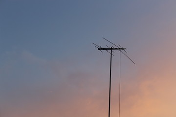 tv antenna on a blue sky