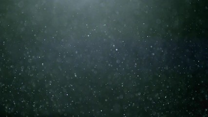 multicolored particles like confetti or spangles float in a viscous liquid and glitter in the light with depth of field. 3d abstract animation of particles in 4k. luma matte as the alpha channe