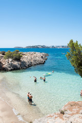 Wall Mural - Beach with people and sea landscape in Punta Negra, Calvia, Majorca