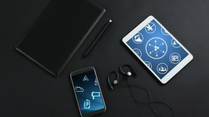 Animation of digital tablet and smartphone showing social icons on the screens
