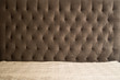 Fabric headboard provides a smooth gradient.