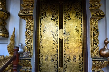 Wall Mural - Painted entrance doors at Wat Klang Wiang in Chiang Rai