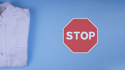 stop sign on blue background. stop covid19