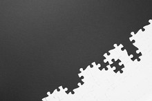 Blank White Puzzle Pieces On Black Background, Flat Lay. Space For Text